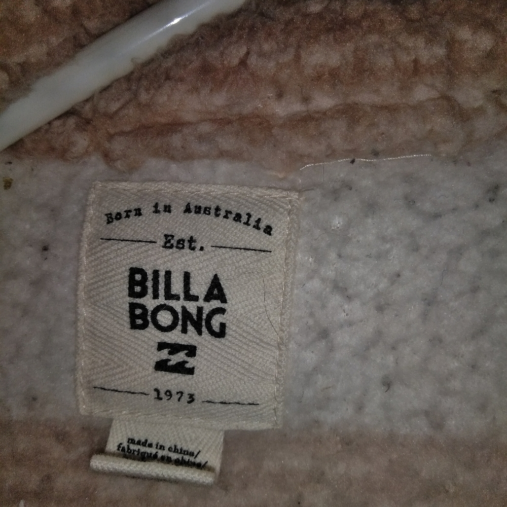 Billabong carnage size medium black, white and tan strips